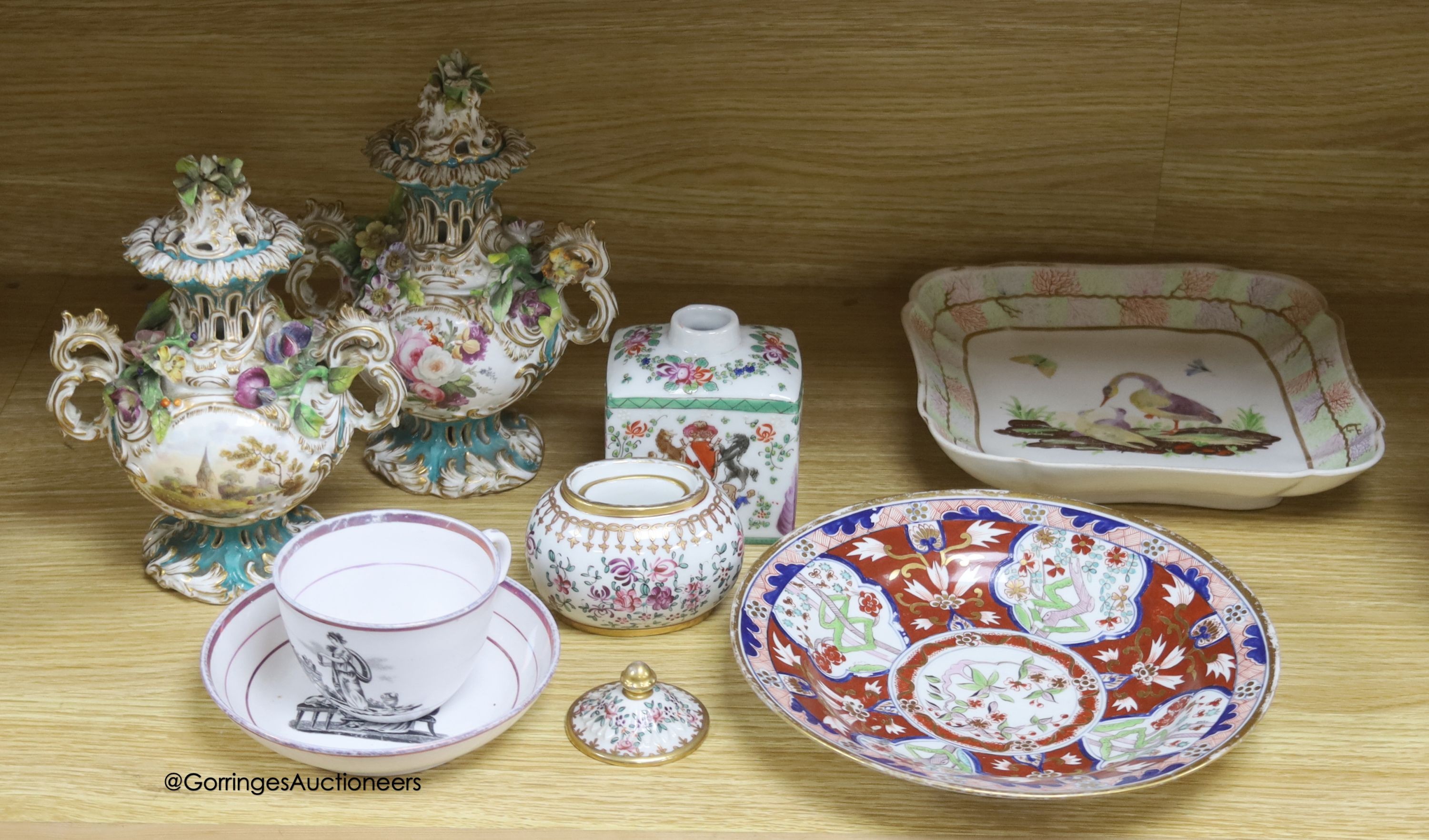 A pair of Rockingham style floral encrusted lidded vases, an armorial jar, two 19th-century English porcelain dishes etc